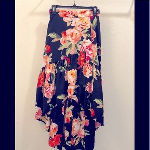 Asymmetrical navy skirt with floral detail